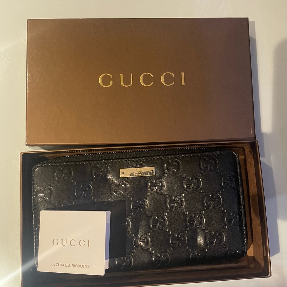 Gucci Guccissima leather zip wallet